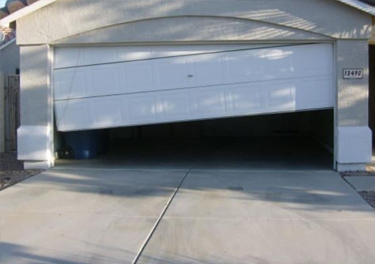 garage door off track repair in in Santa Paula